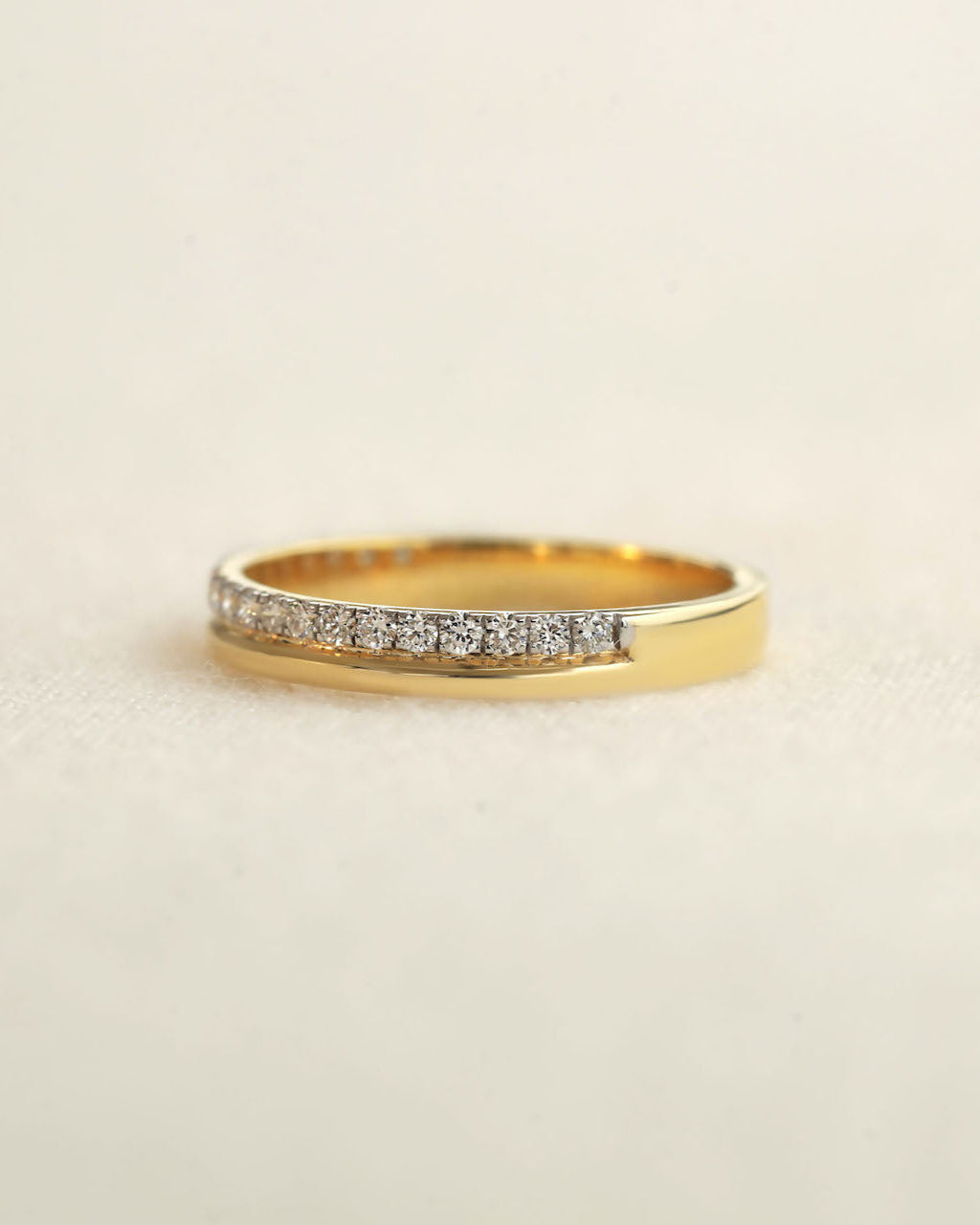 Yellow diamond band on a white background.