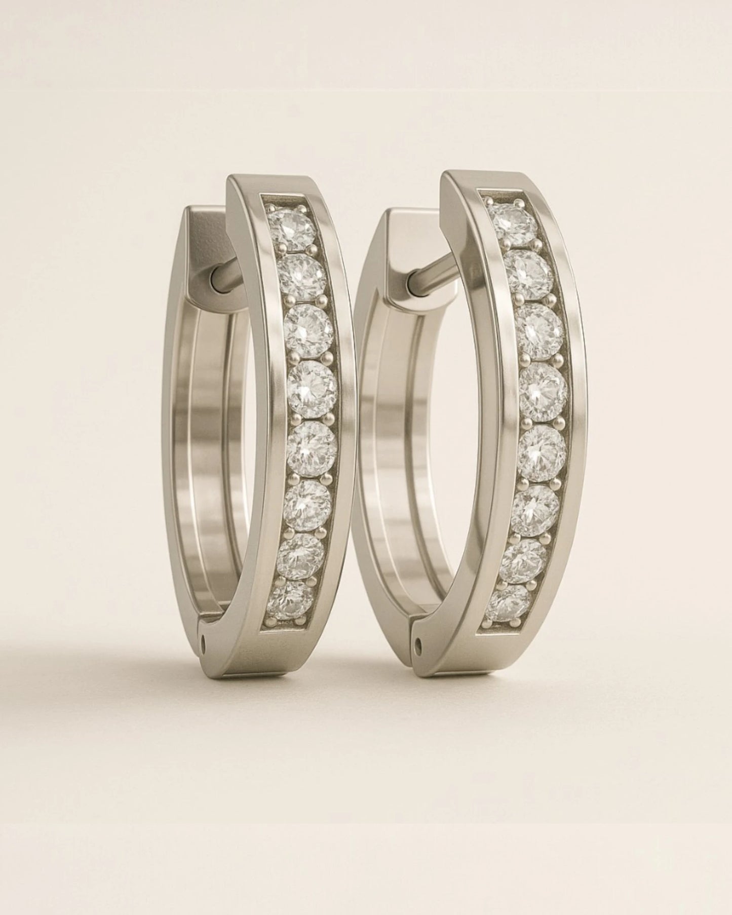 Close up shot of huggie earrings with 0.17 Carat TW of diamonds.