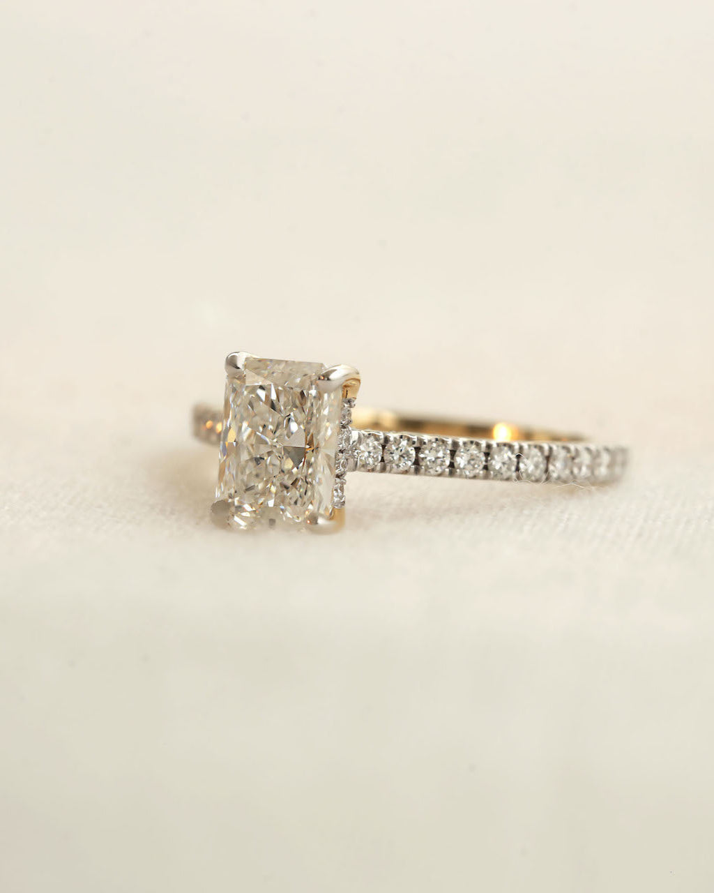 Diamond ring with a beige background