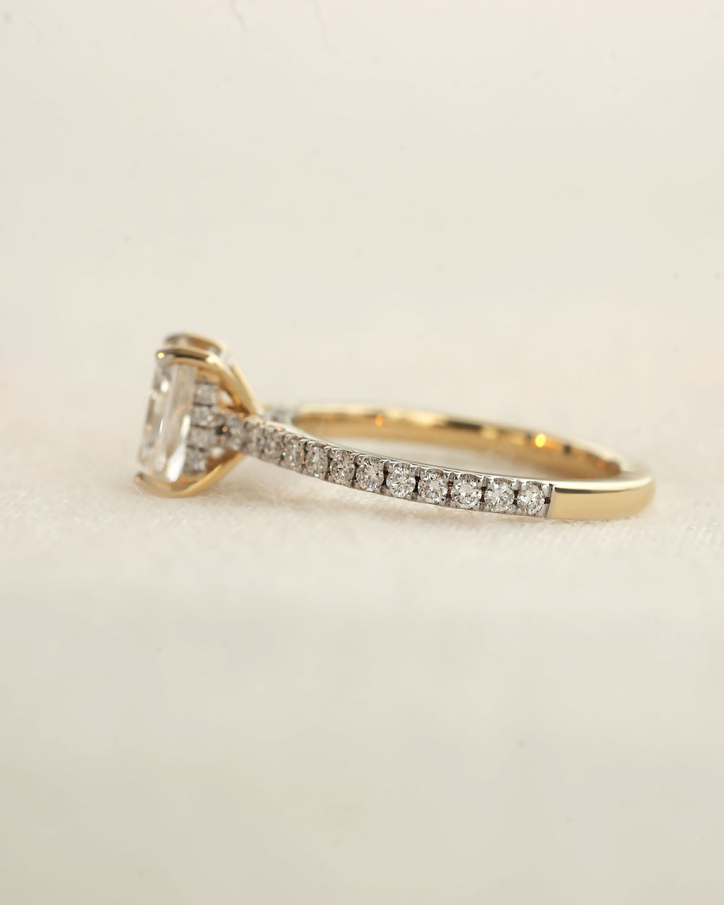 Diamond ring on a light beige background