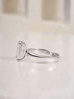 2.00ct emerald cut lab grown diamond solitaire engagement ring, styled shot