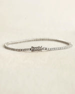Diamond bracelet on a white background.