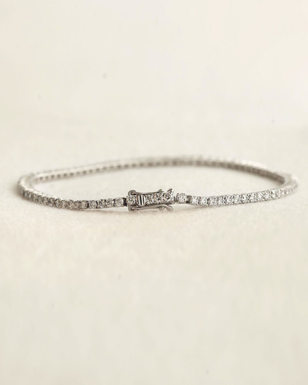 Diamond bracelet on a white background.