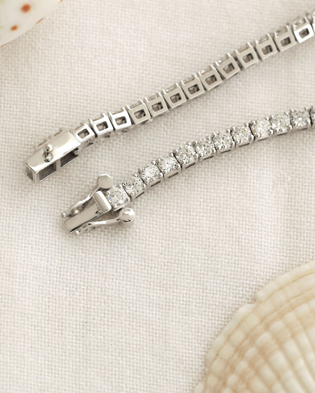 Diamond bracelet on a beige background