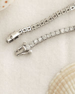 Diamond bracelet on a beige background