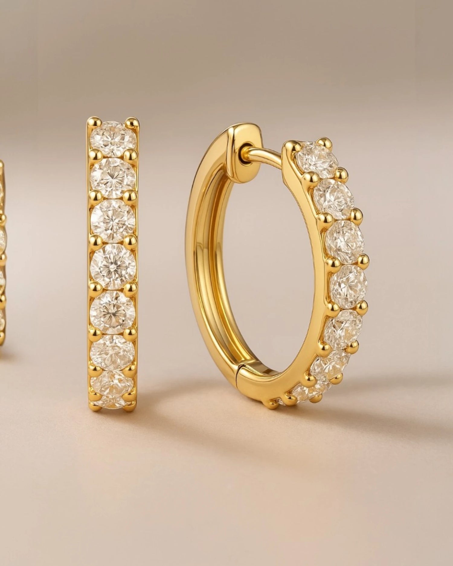  Close up shot of classic pave diamond hoop earrings.