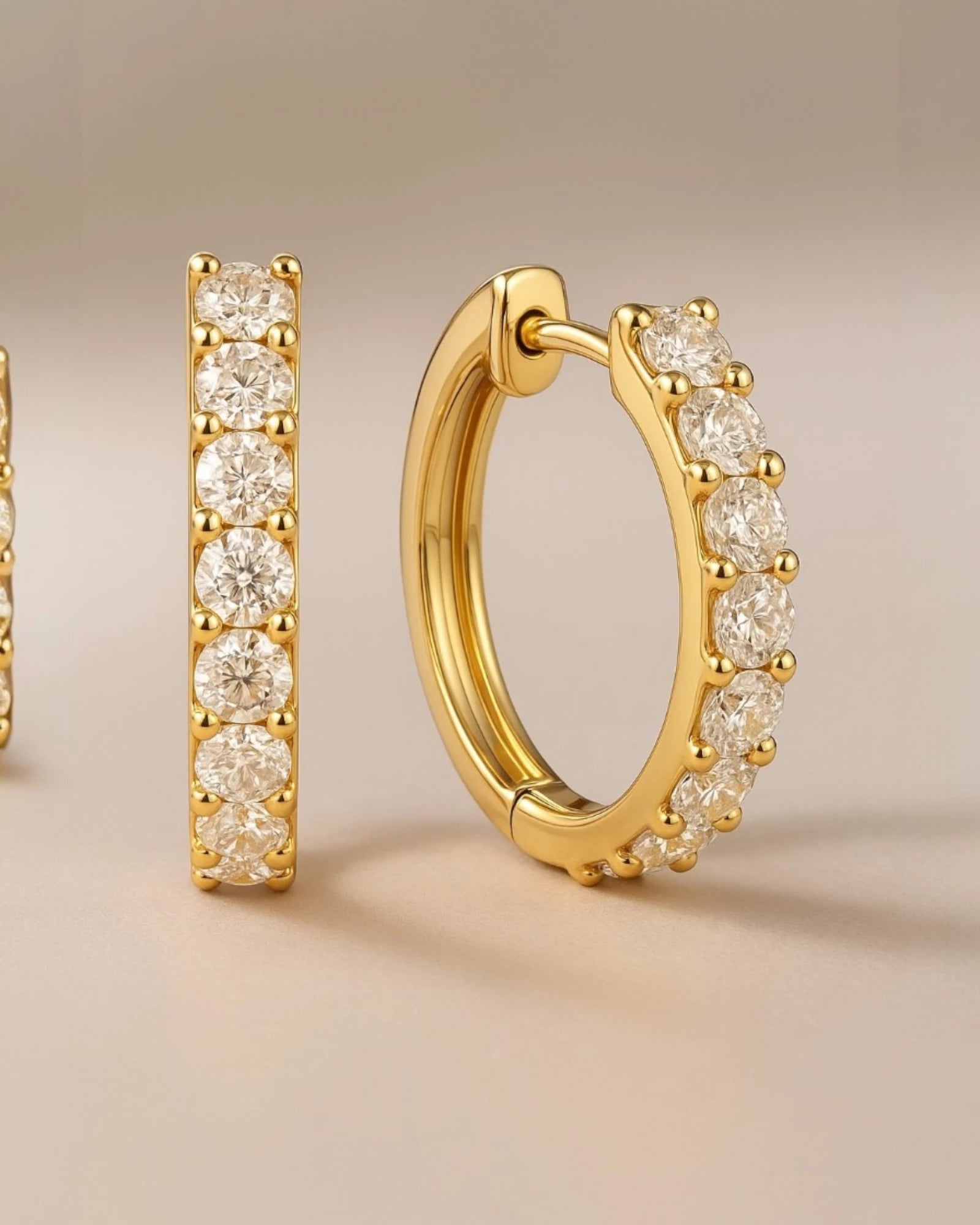  Close up shot of classic pave diamond hoop earrings.