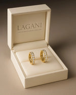  Close up shot of classic pave diamond hoop earrings.