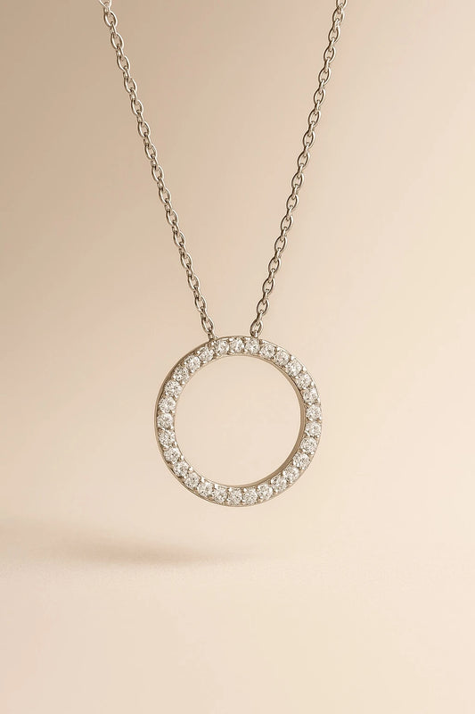 Close up shot of diamond circle pendant necklace.