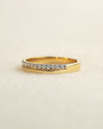 Yellow diamond band on a white background.