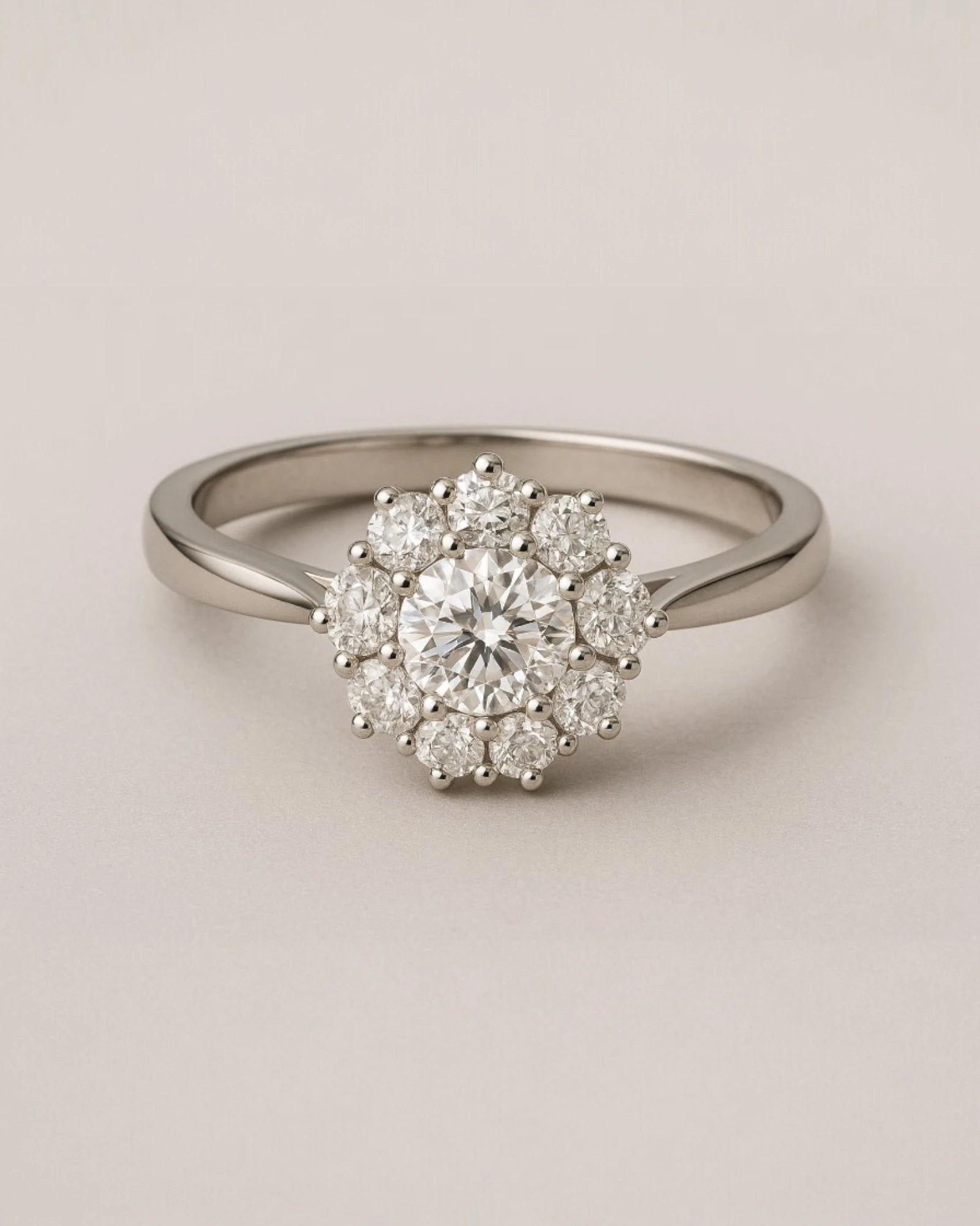 Close up shot of floral halo diamond cluster ring.