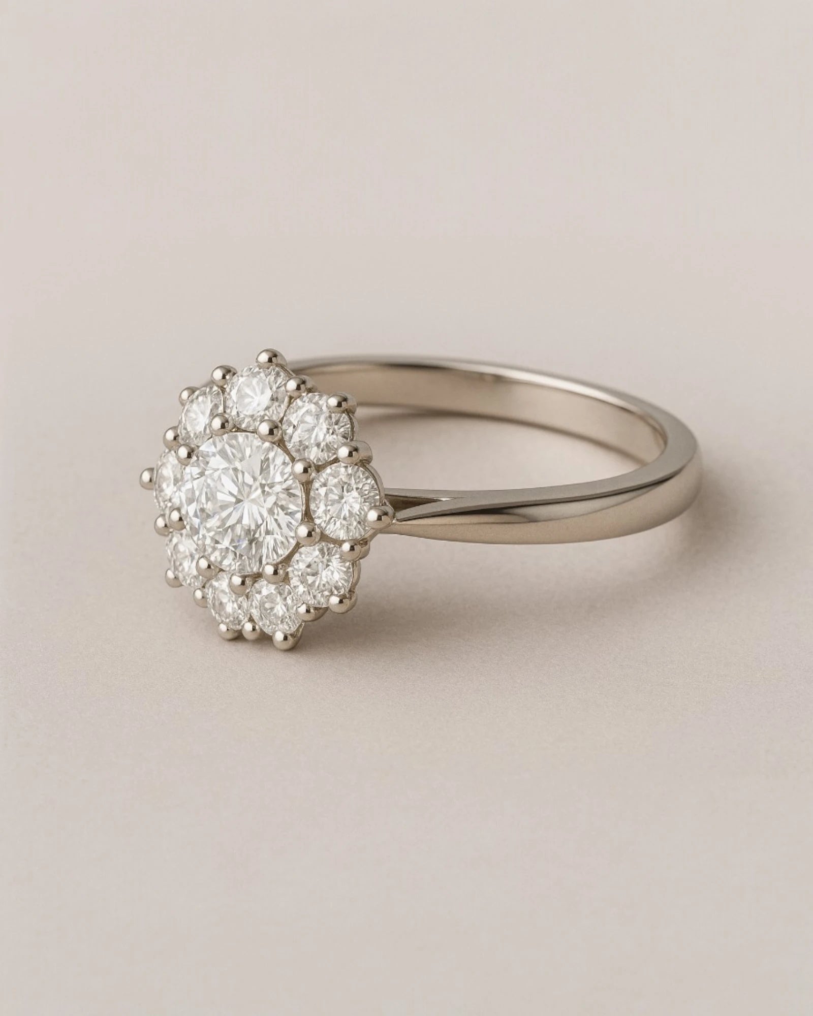 Close up shot of floral halo diamond cluster ring.