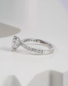 Side view of pear cut lab grown diamond engagement ring in white gold.