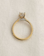 Diamond ring on a light beige background