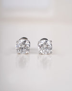 Close up shot of silver studs in white gold.
