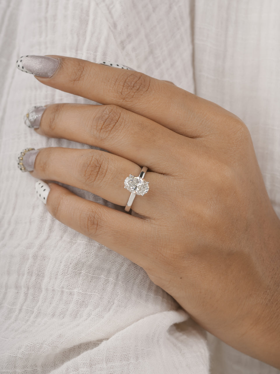 3ct oval lab-grown diamond engagement ring, top-down view of the setting