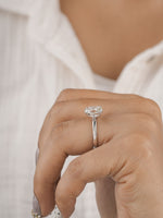 Close-up of 3ct oval lab-grown diamond in classic 4-prong setting