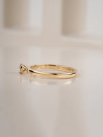 0.30ct round brilliant diamond solitaire engagement ring, angled view showing band detail