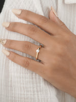 Close-up of round brilliant diamond in classic 4-prong setting
