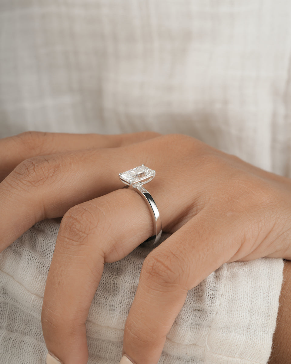 2.00ct Radiant cut lab grown diamond solitaire engagement ring in white gold, close up angle