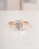 4 ct emerald cut lab grown diamond engagement ring on hand LAGANI