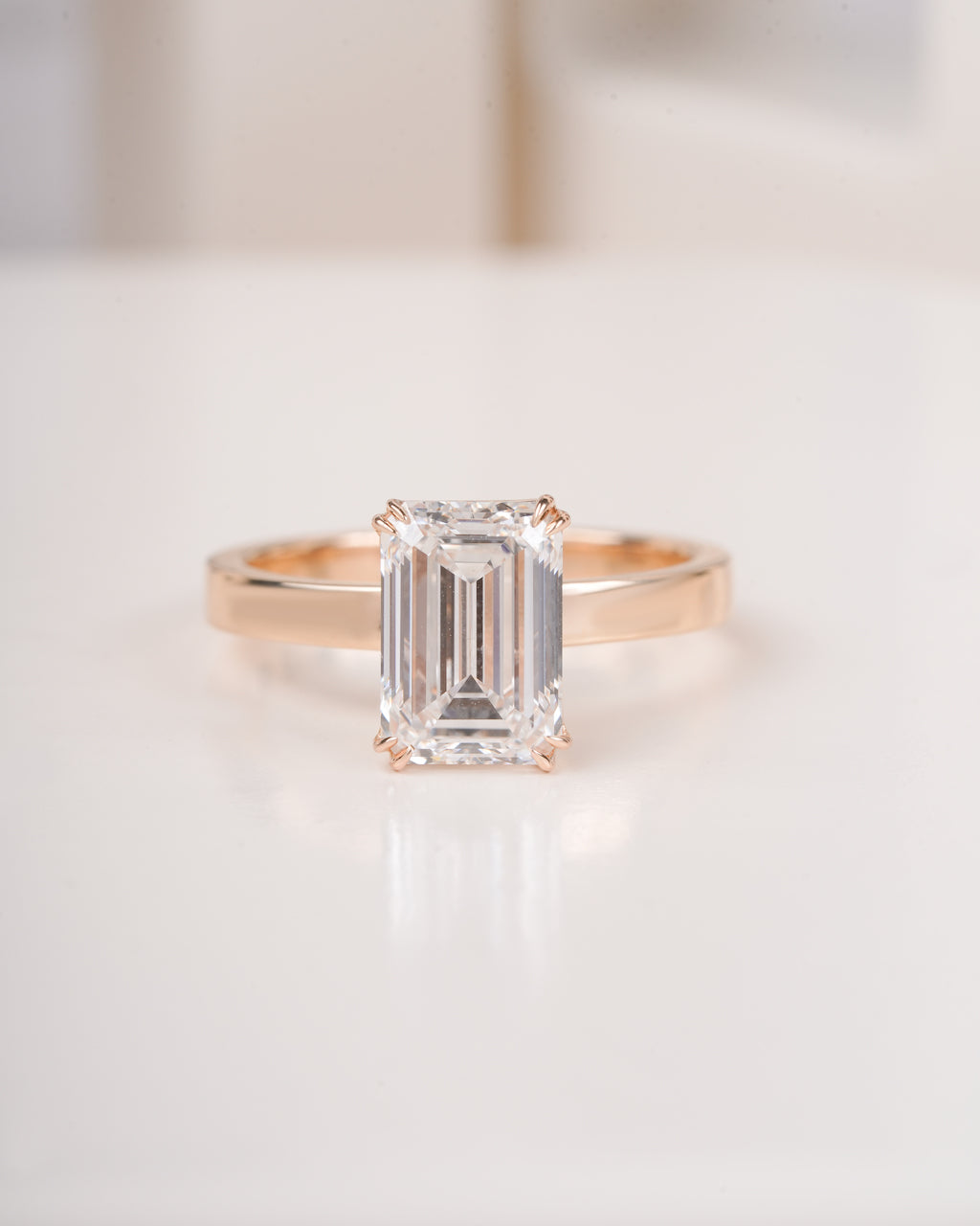 4 ct emerald cut lab grown diamond engagement ring on hand LAGANI