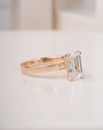 4 ct emerald cut lab grown diamond engagement ring styled shot LAGANI