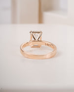 4 ct emerald cut lab grown diamond engagement ring lifestyle image LAGANI