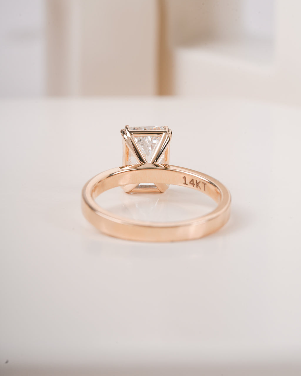 4 ct emerald cut lab grown diamond engagement ring lifestyle image LAGANI
