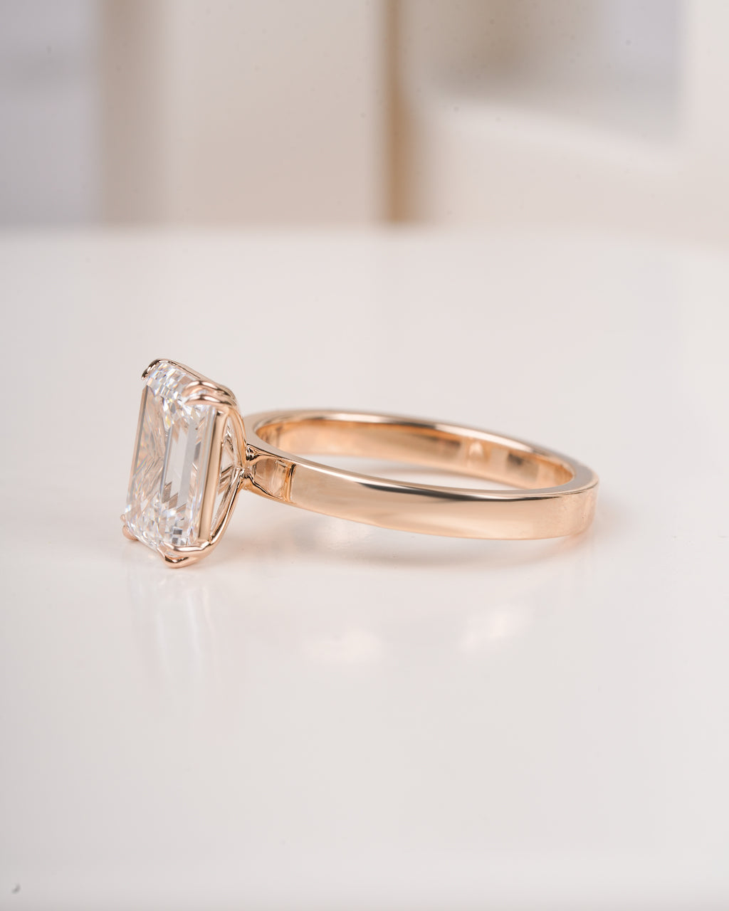 4 ct emerald cut lab grown diamond engagement ring in setting LAGANI